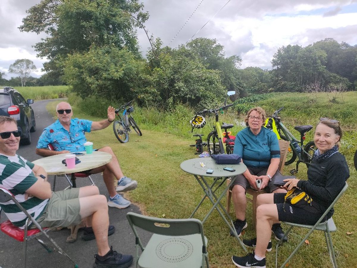 Second lot cyclists at coffee break on the Rous River